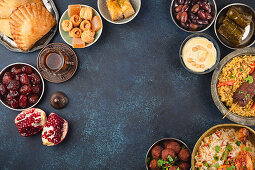 Ramadan kareem Iftar party table with assorted festive traditional Arab dishes
