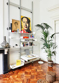 Potted palm and shelves in period apartment