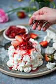 Meringue with strawberries and rhubarb