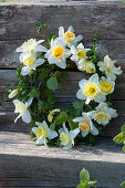 Wreath made of daffodil flowers and hornbeam