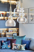 Ceiling lamps made from various types of glass in elegant living room