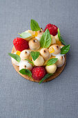 Lemon and basil tart with raspberries