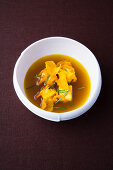 Pepper and rosemary broth with saffron frittata