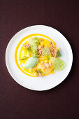Dill sorbet with mango and macadamia crunch
