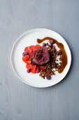 Cured beef fillet with blueberries and red cabbage
