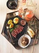 Savoury Christmas gourmet breakfast with hip steak and spicy muffins