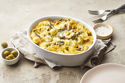 Pasta bake with sausage, sage, cheddar and cream