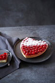 A raspberry heart with sour cream