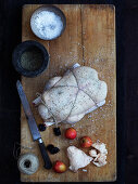 A tied-up duck with apple and plum stuffing