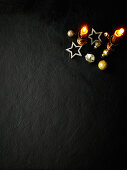 Christmas decorations with candles on a black background