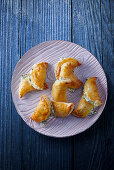 Goat's cheese puff pastries with thyme and thyme honey