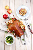 Baked goose with apples and brussels sprout