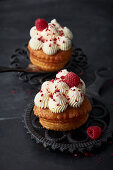 Cruffins with cream cheese icing and raspberries