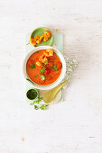 Tomato and coconut soup with prawns