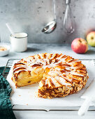 Apple pie with almonds and icing