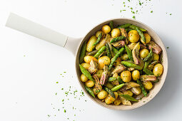 Fried potatoes with spring vegetables