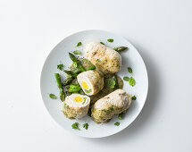 Chicken roulade with green asparagus and quail's eggs