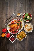 Roast turkey with orange glaze and side dishes