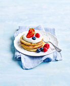 Pancakes with berries and coconut yoghurt