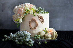 Festive white wedding cake decorated with flowers