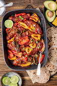 Sausage bake with pepper served with home made tortillas