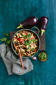 Barley, chickpea and eggplant casserole with parsley pesto