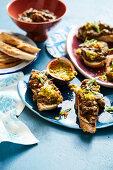 Open banh mi with aubergines, passion fruit, coriander and chilli (Vietnam)