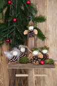 Angels handmade from fir cones, wooden beads, feathers and moss