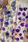 Making homemade pasta with edible flowers