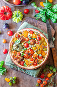 Pie with baked colored tomatoes