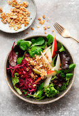 Winter salad bowl with marinated red cabbage