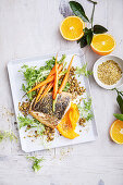 Barramundi with pumpkin, carrots and lentils