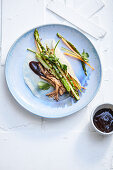 Chinese pancakes with asparagus, pulled pork and plum sauce