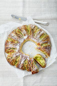 Pistachio and marzipan yeast dough wreath cake