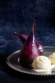 Red wine pears with vanilla ice cream