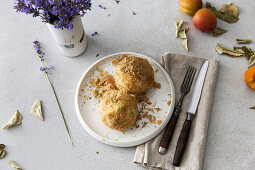 Apricot dumplings with buttered crumbs