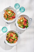 Salad with lentil pasta, raspberries, coriander and jalapenos