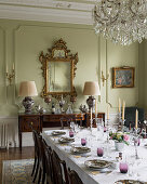 Festively set table in historic dining room