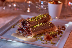Filo rolls with chocolate cream and pistachios