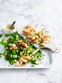 Japanese squid skewers with avocado salad