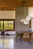Dining room in natural shades in modern, architect-designed house