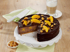 Chocolate cheesecake with orange and peanuts