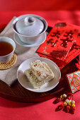 Crunchy rice candy and tea (China)