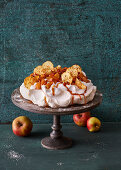Baked apple pavlova with apple chips and caramel