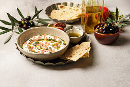 Iranian labneh with taftan bread and pomegranate