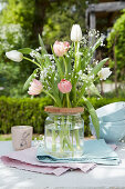 Easter bouquet of tulips and gypsophila (baby's breath)