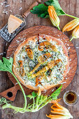 Zucchini flowers pizza with sour cream and balsamic