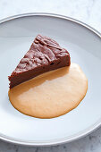 Warm chocolate fudge brownie with earl grey custard