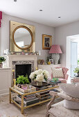 Vintage coffee table and French-style sofa with gold mirror