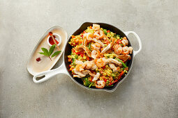 Paella with chicken and shrimp